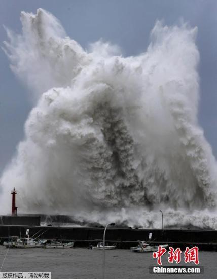 25年来最强台风袭日本：机场淹水 摩天轮吹成风车