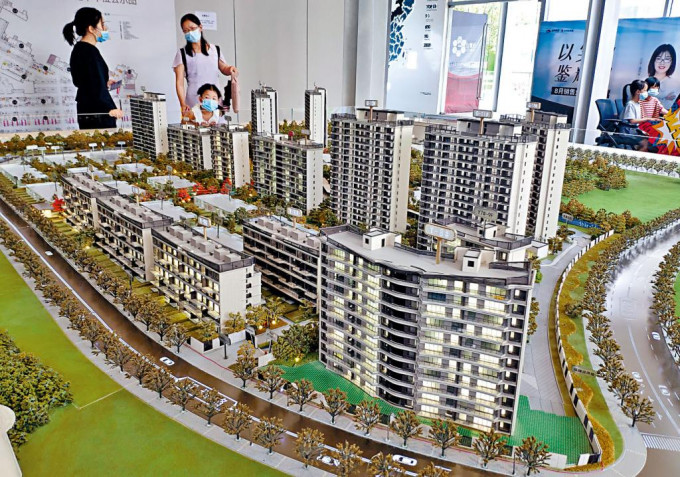 中国房地产商卖房出奇招 西瓜换房水蜜桃换房