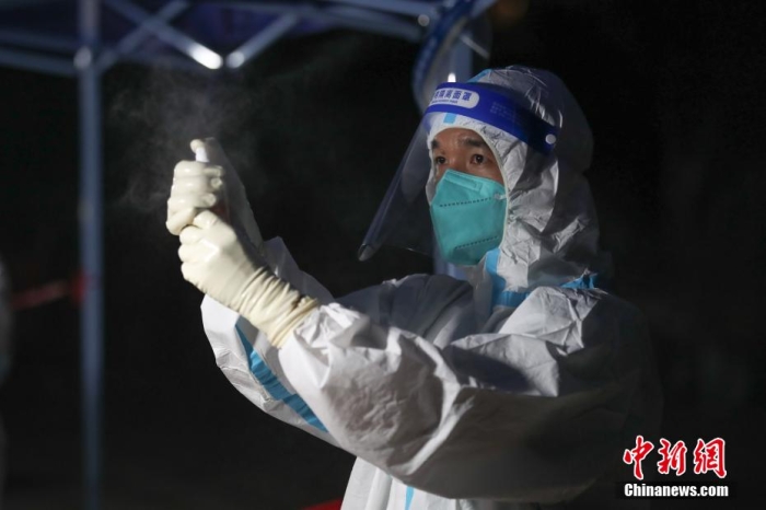 中国官方解读优化新冠肺炎疫情防控措施出台背景