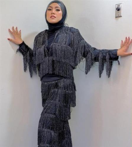 茜拉曾参加内地歌唱节目《我是歌手》第二季。网图