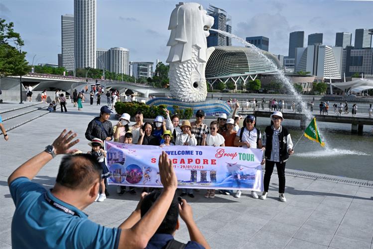 今年3月入境新加坡的旅客超过100万人次。 路透