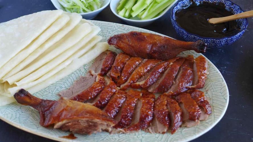 北京鸭是中国菜中不可缺席的佳肴美食。  资料图片